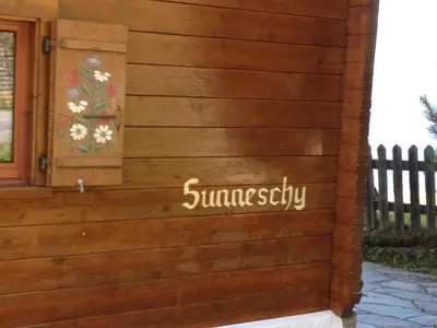 Ein Zertifikat, Auszeichnung, Logo oder anderes Dokument, das in der Unterkunft Apartment Sunneschy 1- OG Süd by Interhome ausgestellt ist