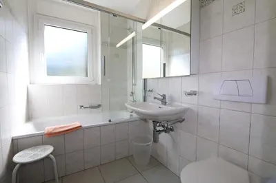 Ein Badezimmer in der Unterkunft Haus Cristal