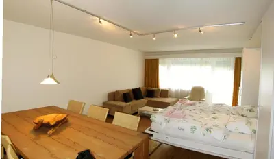 Ein Sitzbereich in der Unterkunft Haus Cristal