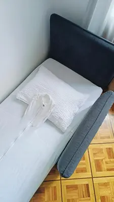 Ein Bett oder Betten in einem Zimmer der Unterkunft Casa Jenini - Wohnung im Patrizierhaus neben Schloss Leuk