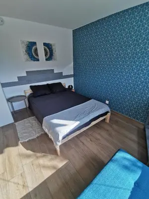 Ein Bett oder Betten in einem Zimmer der Unterkunft Cocon valaisan