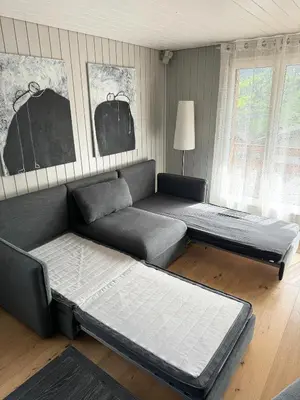 Ein Bett oder Betten in einem Zimmer der Unterkunft Eigentumswohnung in Grindelwald
