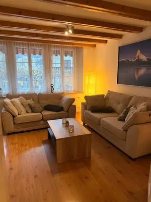Ein Sitzbereich in der Unterkunft 3,5 Zimmer Wohnung Eigerblick zentral in Grindelwald