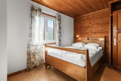 Ein Bett oder Betten in einem Zimmer der Unterkunft Charmant logement familial à Euseigne