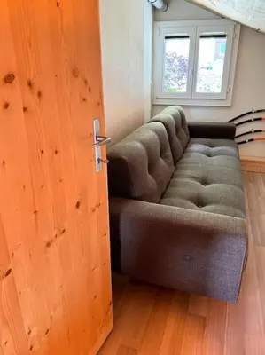 Ein Sitzbereich in der Unterkunft Chalet AlpinLux in Beatenberg
