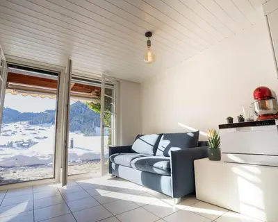 Ein Sitzbereich in der Unterkunft Chalet Bächlerhaus