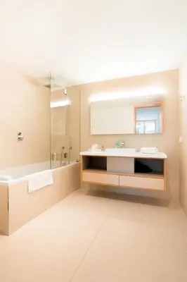 Ein Badezimmer in der Unterkunft Gotthard Hotel Apartment
