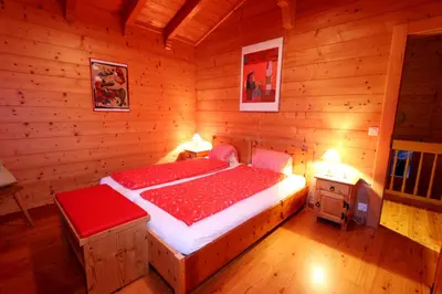 Ein Bett oder Betten in einem Zimmer der Unterkunft Chalet Les Mélèzes