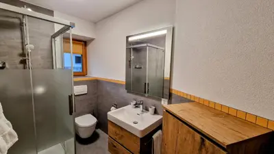 Ein Badezimmer in der Unterkunft Chalet Les Mélèzes
