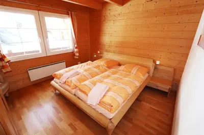 Ein Bett oder Betten in einem Zimmer der Unterkunft Chalet Inge
