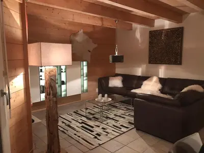 Ein Sitzbereich in der Unterkunft Chalet Inge