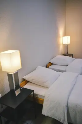 Ein Bett oder Betten in einem Zimmer der Unterkunft Alaïa Hostel