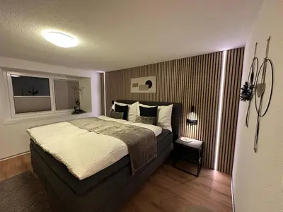 Ein Bett oder Betten in einem Zimmer der Unterkunft Apartment Enzian