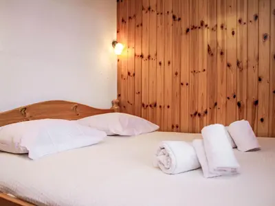 Ein Bett oder Betten in einem Zimmer der Unterkunft Chalet Chalet Soleil by Interhome
