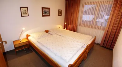 Ein Bett oder Betten in einem Zimmer der Unterkunft Hirsch