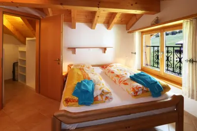 Ein Bett oder Betten in einem Zimmer der Unterkunft Dominic B