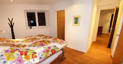 Ein Bett oder Betten in einem Zimmer der Unterkunft Dolomit