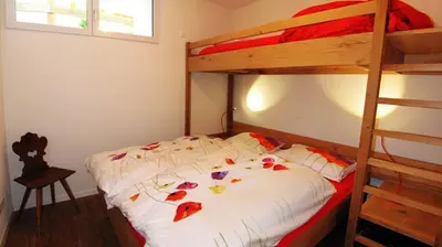 Ein Bett oder Betten in einem Zimmer der Unterkunft Dolomit