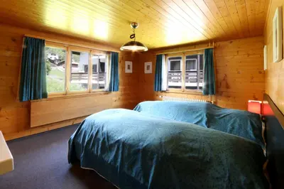 Ein Bett oder Betten in einem Zimmer der Unterkunft Chalet les Mayens