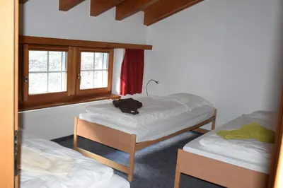 Ein Bett oder Betten in einem Zimmer der Unterkunft Flamingo