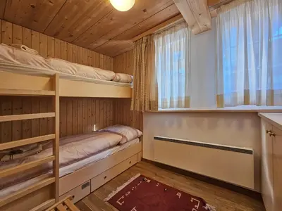 Ein Bett oder Betten in einem Zimmer der Unterkunft Chalet Renu