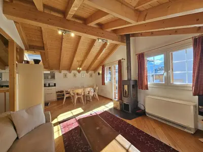 Ein Sitzbereich in der Unterkunft Chalet Renu