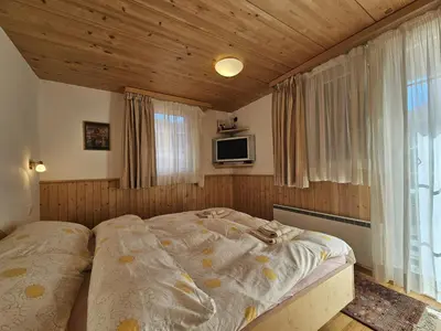 Ein Bett oder Betten in einem Zimmer der Unterkunft Chalet Renu