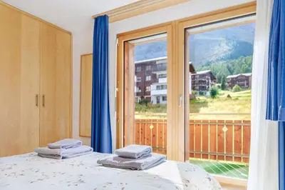 Ein Bett oder Betten in einem Zimmer der Unterkunft Haus Snow Fun B