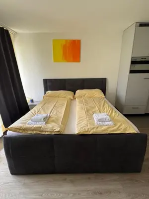 Ein Bett oder Betten in einem Zimmer der Unterkunft Studio 102 - Riverside