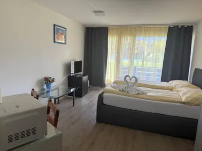 Ein Bett oder Betten in einem Zimmer der Unterkunft Studio 102 - Riverside