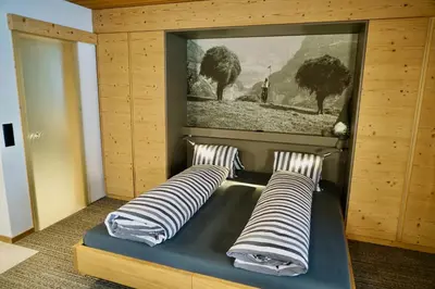 Ein Bett oder Betten in einem Zimmer der Unterkunft Chalet Schwendiboden