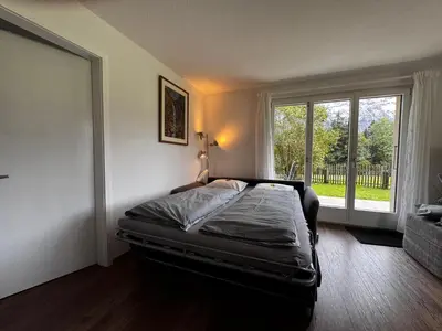 Ein Bett oder Betten in einem Zimmer der Unterkunft Chalet Casa Rosina