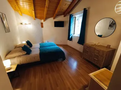 Ein Bett oder Betten in einem Zimmer der Unterkunft Le Bargeot à Baar