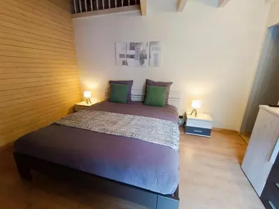 Ein Bett oder Betten in einem Zimmer der Unterkunft Le Bargeot à Baar