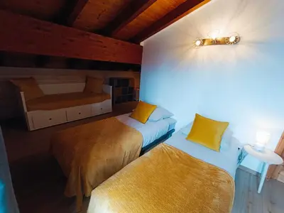 Ein Bett oder Betten in einem Zimmer der Unterkunft Le Bargeot à Baar