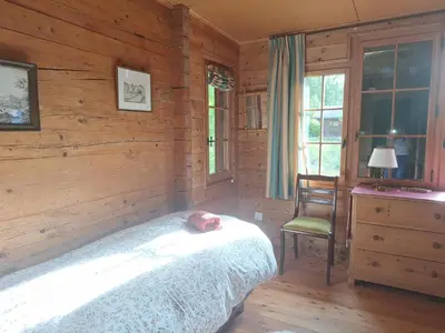 Ein Bett oder Betten in einem Zimmer der Unterkunft Chalet de La Tour Mayens de Sion 4 Vallées