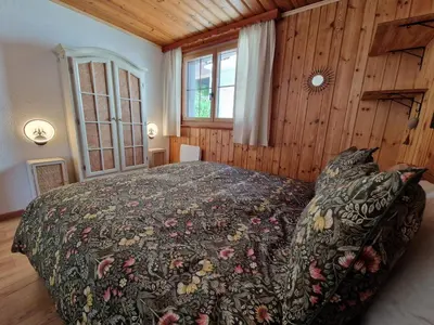Ein Bett oder Betten in einem Zimmer der Unterkunft Chalet typique proche Crans Montana