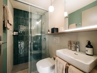 Ein Badezimmer in der Unterkunft KURVE Apartments & Lounge
