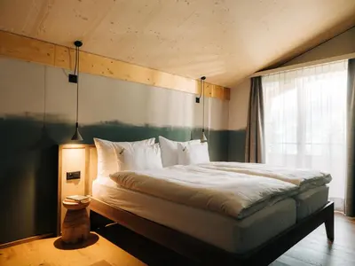 Ein Bett oder Betten in einem Zimmer der Unterkunft KURVE Apartments & Lounge