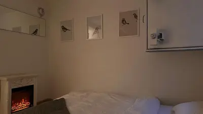 Ein Bett oder Betten in einem Zimmer der Unterkunft Meiringen Retreat - Sauna, Terrace & Pinball