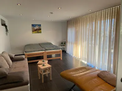 Ein Sitzbereich in der Unterkunft Komfortable Wohnung