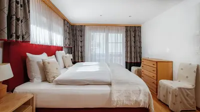 Ein Bett oder Betten in einem Zimmer der Unterkunft Haus Malva by Zermatt Premium Apartments