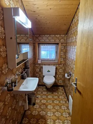 Ein Badezimmer in der Unterkunft Swiss Chalet direkt am Thunersee
