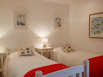 Ein Bett oder Betten in einem Zimmer der Unterkunft Chalet Crettamour by Interhome