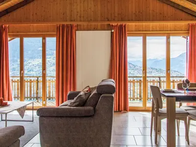 Ein Sitzbereich in der Unterkunft Apartment Beau Soleil - Gentianes 40 by Interhome