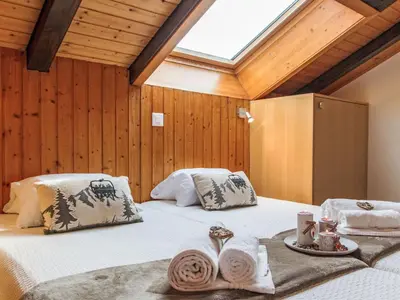 Ein Bett oder Betten in einem Zimmer der Unterkunft Apartment Beau Soleil - Gentianes 40 by Interhome