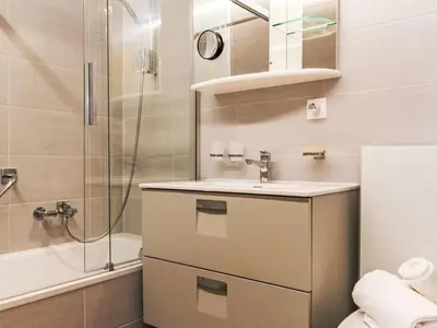Ein Badezimmer in der Unterkunft Apartment Beau Soleil - Gentianes 40 by Interhome