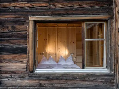 Ein Bett oder Betten in einem Zimmer der Unterkunft POORT A POORT Dorfhotel