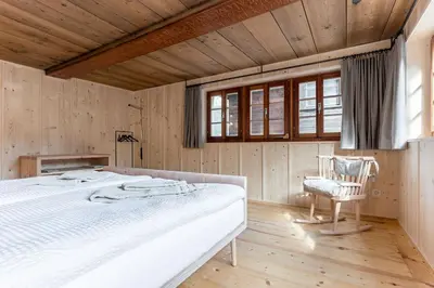 Ein Bett oder Betten in einem Zimmer der Unterkunft POORT A POORT Dorfhotel