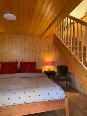 Ein Bett oder Betten in einem Zimmer der Unterkunft La Chambre Du Bisse